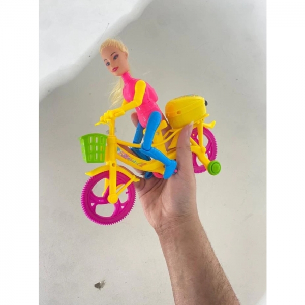 Boneca Com Bicicleta Ciclista Pedala Brinquedo